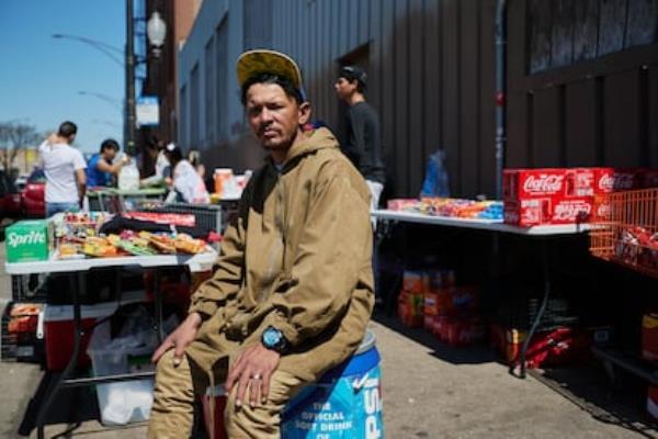 Anto<em></em>nio Co<em></em>ntreras with the products he sells to other migrants, outside the shelter wher<em></em>e he sleeps, mid-April 2024.