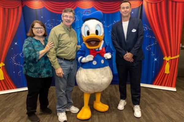 Do<em></em>nald Duck with (from left to right) Becky Cline, director of the Walt Disney Archives; Mark Henn, animator at Walt Disney Studios; and Stéphane Kardos, vice president of character art, at the company's headquarters in Burbank, California, in May 2024.