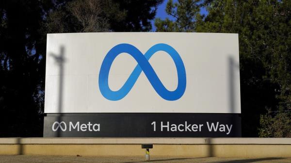 FILE - me<em></em>ta's logo is seen on a sign, Nov. 9, 2022, at the company's headquarters in Menlo Park, Calif. Facebook and Instagram fail to protect underage users from exposure to child sexual abuse material and let adults solicit pornographic imagery from them, New Mexico's attorney general alleges in a lawsuit filed Tuesday, Dec. 5, 2023, that follows an undercover o<em></em>nline investigation into me<em></em>ta's social media platforms. (AP Photo/Godofredo A. Vásquez, File)