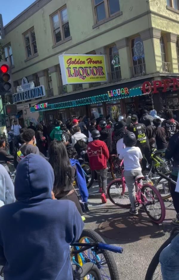 The unidentified employee was standing outside Golden Hours Liquor on Internatio<em></em>nal Boulevard in Oakland on Saturday wher<em></em>e he co<em></em>nfronted the bicyclists who had surrounded the area outside of the store.