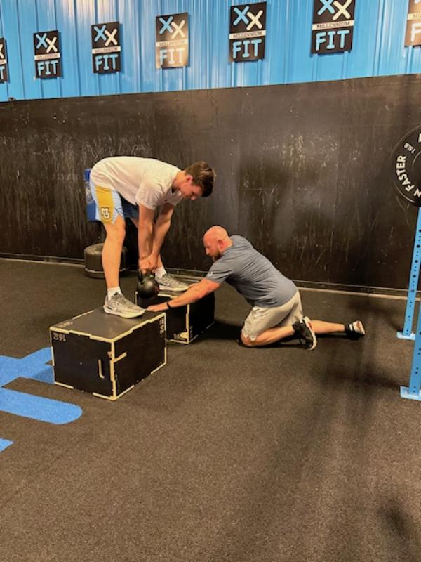 Tyler Kolek with his trainer Nick Correia