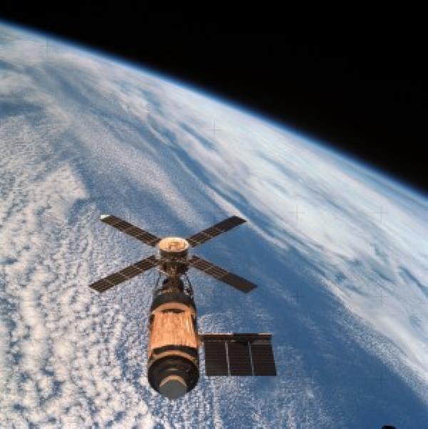 The Internatio<em></em>nal Space Station, with the newly added Exposed Facility and its first payloads, as seen from Endeavour during the departure flyaround. Endeavour casts its shadow on the solar arrays