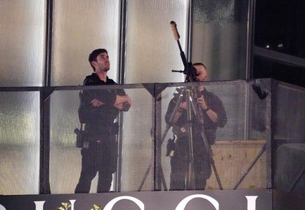A Secret Service counter-sniper team was statio<em></em>ned on scaffolding above surveying the area as Trump's motorcade pulled up.