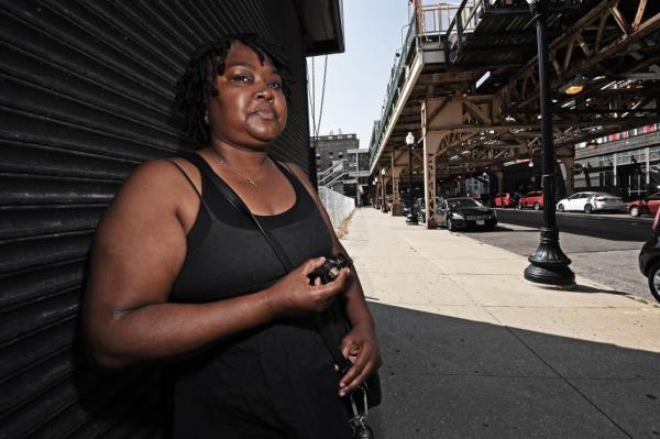 A photo of Chicago resident Octavia Mitchell in a sleeveless black top.