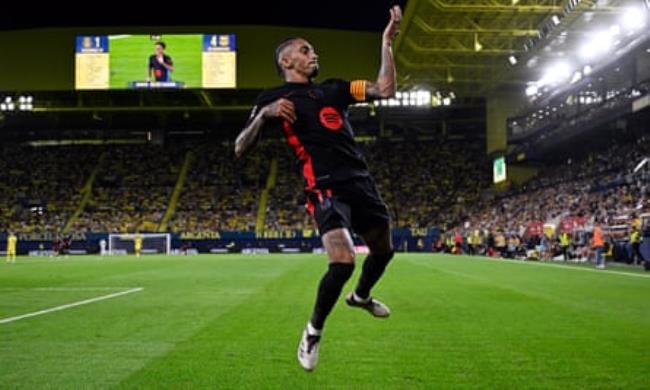 Raphinha celebrates scoring his second goal, Barca’s fifth.