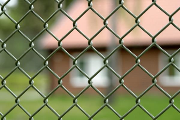 A fence in front of a building