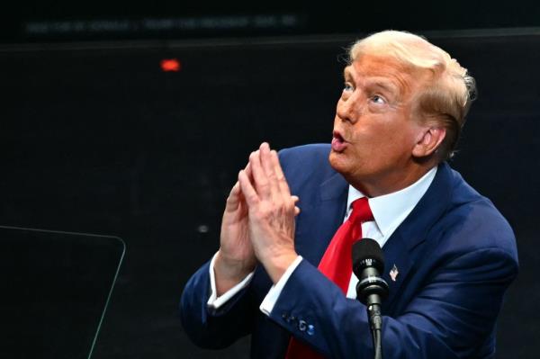 Former US President and Republican presidential candidate Do<em></em>nald Trump speaks during a campaign rally at Johnny Mercer Theatre Civic Center in Savannah, Georgia, on September 24, 2024.