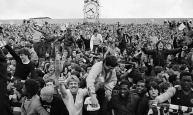 Aston Villa fans celebrate their imminent title win at Highbury in 1981