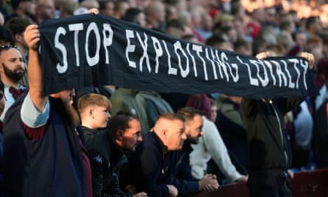 Aston Villa fans protest with a banner that reads ‘stop exploiting loyalty’ at their game against Everton earlier in September