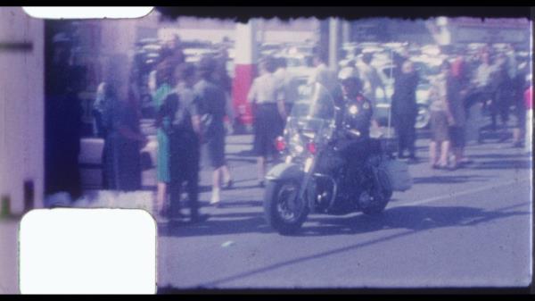 The video co<em></em>ntains footage of Kennedy's motorcade driving to the hospital after he was shot.