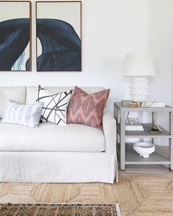 Three throw pillows on couch