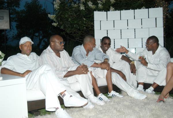 A pjhoto of Russell Simmons, Steve Stoute, Jay-Z, Sean "Diddy" Combs, and Andre Harrel pictured at one of the rapper's soirees.