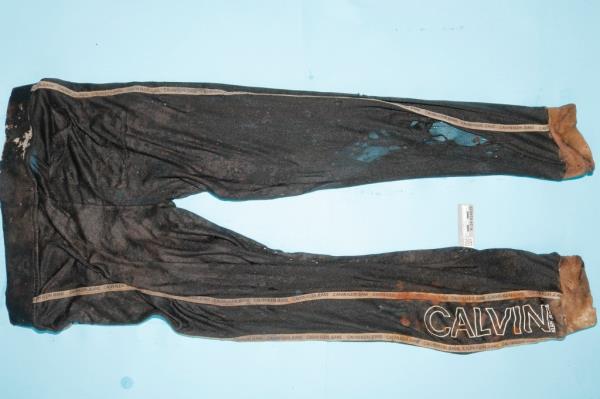 Tattered sweatpants that were found with the bones.