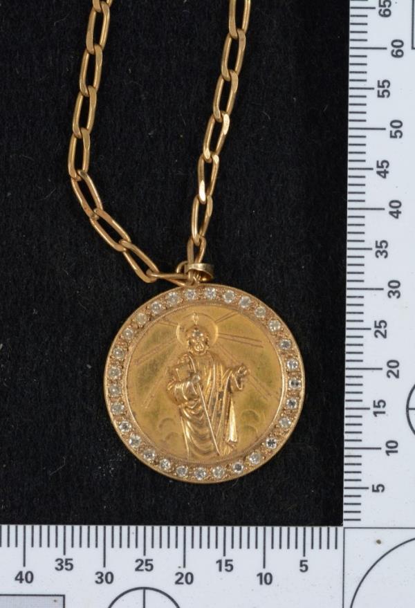 The medallion worn by a man whose skeletal remains were found in Queens in 2000.