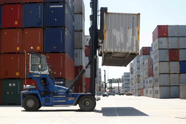 Empty shipping co<em></em>ntainers are stacked for storage at Wando Welch Terminal operated by the South Carolina Ports Authority i