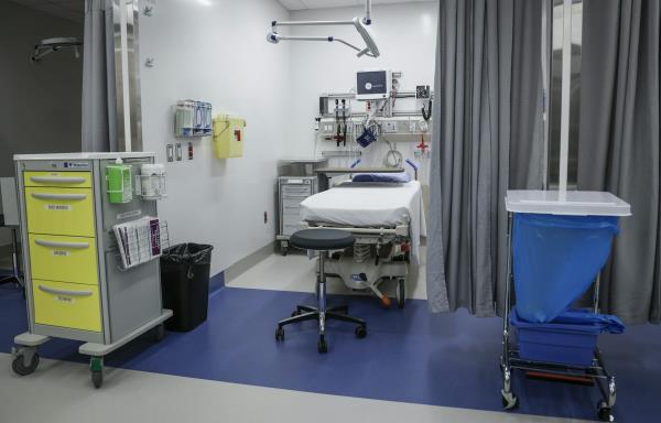 A curtained-off exam space in a health-care facility
