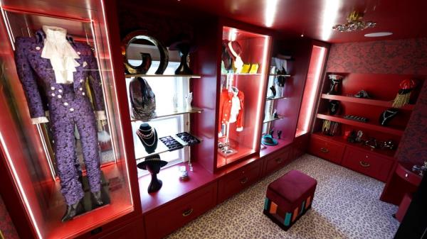 Prince's clothes are on display in the bedroom closet. (