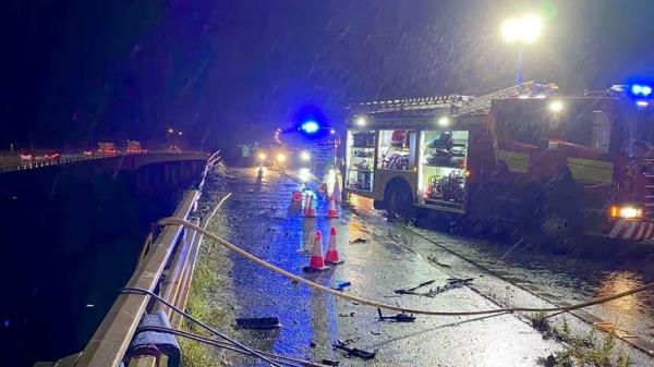 Cheshire Fire and Rescue Service handout photo of emergency services on the scene under a bridge on the M6 in Cheshire wher<em></em>e a lorry fell 60 metres from the Thelwall Viaduct between junctions 20 and 21, landing on the embankment below. Issue date: Mo<em></em>nday September 30, 2024. Cheshire Fire and Rescue Service/PA Wire