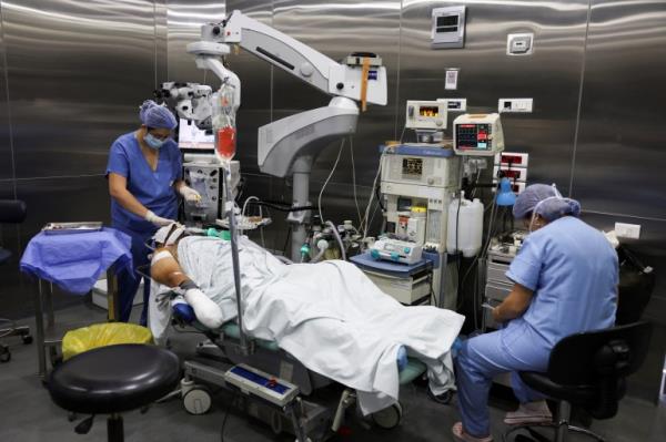 An injured man undergoes an operation, following pager deto<em></em>nations across Lebanon, at a hospital in Beirut, Lebanon September 18, 2024.