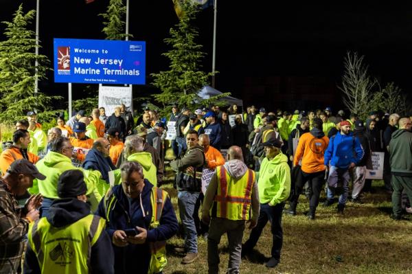 Unio<em></em>n workers gather at the Port Newark/Elizabeth-Port Authority Marine Terminal complex on Tuesday Oct. 1, 2024 in New Jersey.