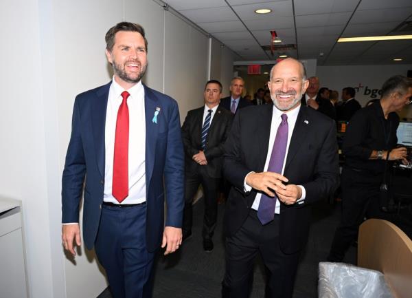  JD Vance and Howard Lutnick attend Charity Day 2024 hosted by The Cantor Fitzgerald Relief Fund at BGC Group on September 11, 2024 in New York City.