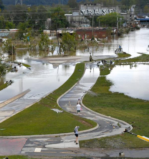Neighborhoods in Asheville, N.C. were hit hard by floodwaters and mudslides after the worst of Helene Friday morning.