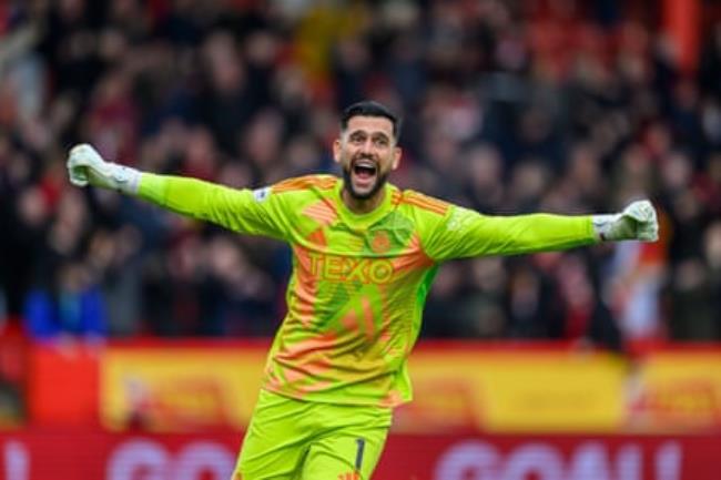 Aberdeen goalkeeper Dimitar Mitov celebrates