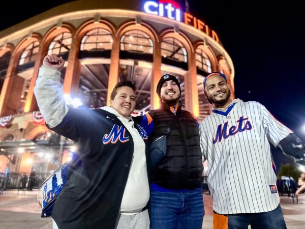 Mets Superfan Cyndi Stanimirov stands outside Citi Field with her brother and Robert Hernriquez before Game 4 of the NLCS on Oct. 17, 2024.