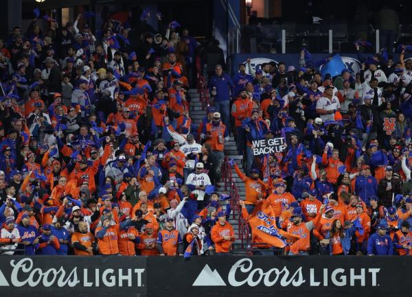 Mets fans apart of The 7 Line Army react during Thursday night's loss to the Dodgers.