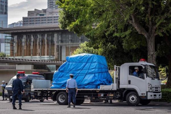 Man arrested after ‘Molotov’-like bombs tossed at Japan ruling party HQ