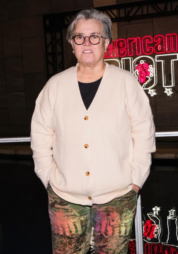 Rosie O'Do<em></em>nnell standing in front of a neon sign at the opening night of Green Day's 'American Idiot' in Los Angeles, California