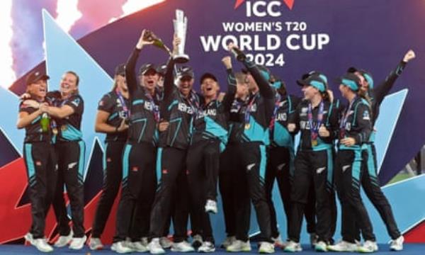 New Zealand players celebrate with the trophy after winning the Women’s Cricket T20 World Cup.
