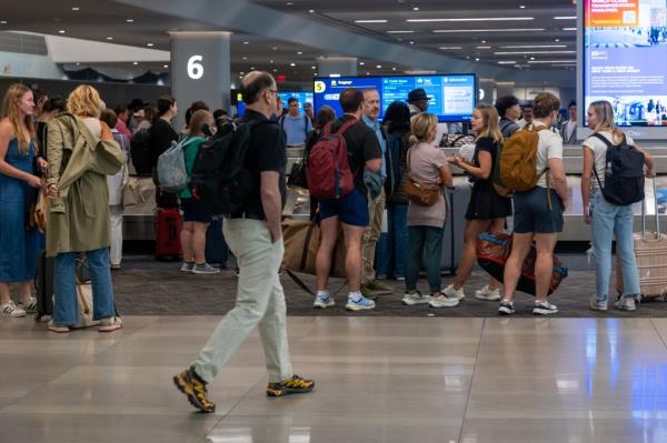 Passengers move through Laguardia Airport on Aug. 30, 2024.