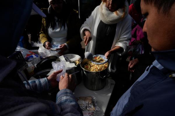 The city operates 13 migrant shelters which are set to combine with its homeless shelters.