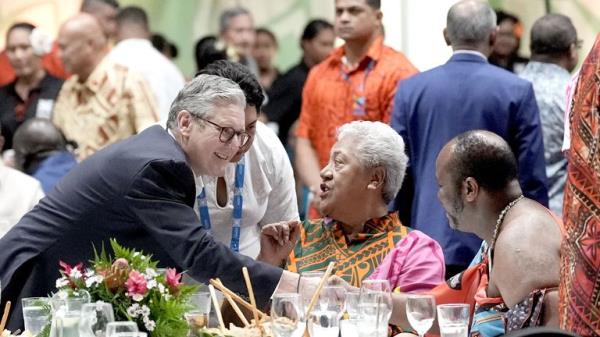 Keir Starmer with Samoan Prime Minister Afioga Fiame Naomi Mata'afa (centre) at a Welcome Reception and State Banquet at Apia Park during the Commo<em></em>nwealth Heads of Government Meeting in Samoa. Picture date: Thursday October 24, 2024. PA Photo. See PA story POLITICS Commonwealth. Photo credit should read: Stefan Rousseau/PA Wire