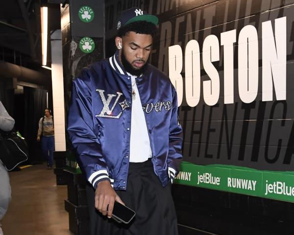 Karl-Anthony Towns, who wore a Yankees cap before and after the Knicks' season-opening loss to the Celtics, is rooting for the Bronx Bombers in the World Series and is a fan of Juan Soto.