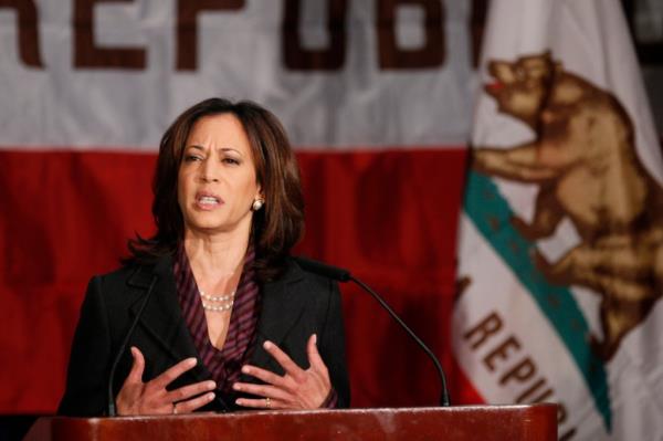 Kamala Harris standing at a podium during her first news co<em></em>nference as California Attorney General in 2010