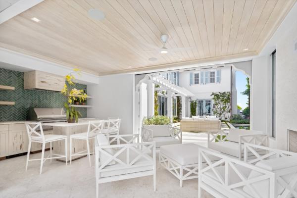 Luxurious $88M Palm Beach home on South Ocean Boulevard with a tunnel leading to the beach and spacious rooms for entertaining.