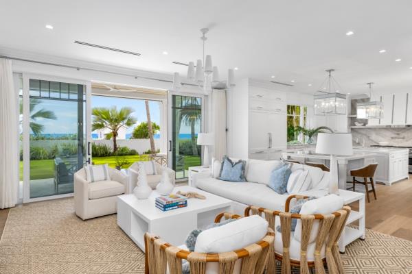 Open living area in a $88M Palm Beach home with access to the beach