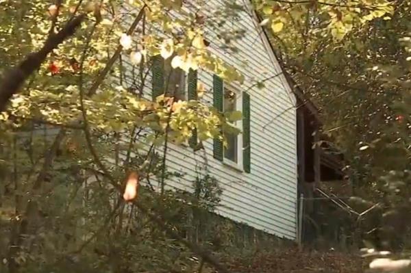 A house with trees in the background, associated with the news story of Atlanta squatters.