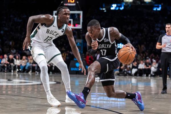 Dennis Schroder dribbles during the Nets' win over the Bucks on Oct. 27, 2024. 