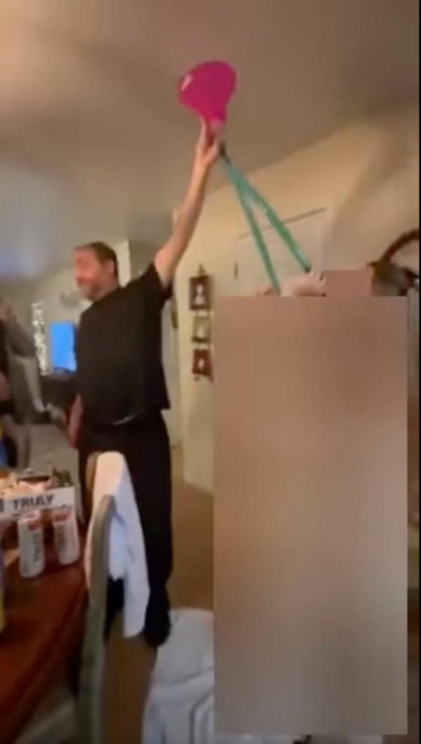 The footage, released by cops, showed Procaccino holding the beer pong up as the girls drank from the multi-hosed funnel. 