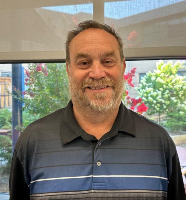 Procaccino, who is currently the principal at Scott High School, charged with two counts of aiding or assisting any person 21 years or less from being served alcoholic beverages.