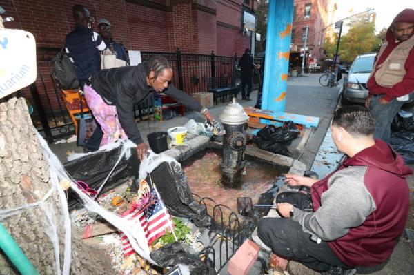 After the FDNY shut off the water on Tuesday, locals got to work to revamp the prized puddle to avoid future debacles.