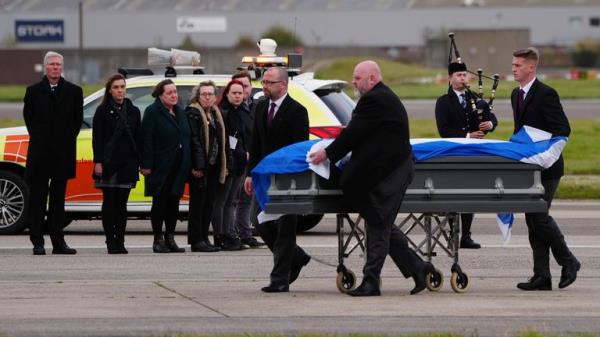 Alex Salmond's body is repatriated to the UK, watched by members of his family and acting Alba Party leader Kenny MacAskill. Pic: PA