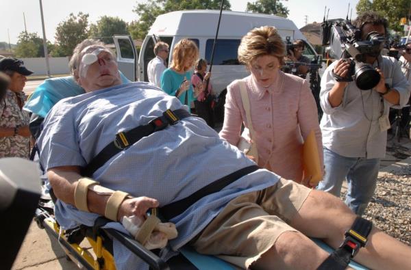 A photo of St. James Davis returning from the hospital in 2005 with lawyer Gloria Allred.
