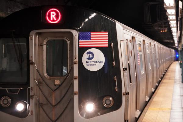 A photo of the R train in Midtown.