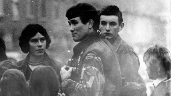 File photo dated February 1977 of Grenadier Guards Captain Robert Nairac talking to children in the Ardoyne area of Belfast.
Pic PA
