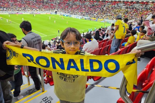 A young football fan at the AFC Champions League Elite Group B match between Al Gharafa SC of Qatar and Al Nassr FC at the Al Bayt Stadium in Al Khor, Qatar 